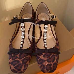 Elegant Leopard Print Flats with Black Bow Accents